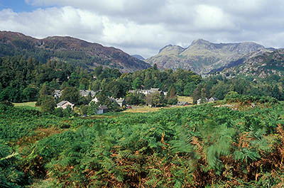 ENG: The Northwest Region, Cumbria, Lake District National Park, Central Lakes Area, Great Langdale, View over the village of Elterwater, with mountain peaks Lingmoor Fell (lt), Langdale Pikes (ctr), High Raise (rt) [Ask for #262.428.]