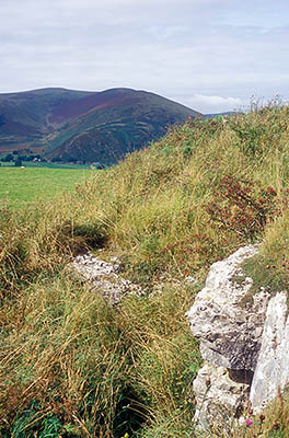 ENG: The Northwest Region, Cumbria, The Eden Valley, Penrith, Whitbarrow Village, View towards Blencathra, a peak within the Lakes District National Park, over an abandoned limestone quarry on the Naddles Crags outside the village [Ask for #262.453.]