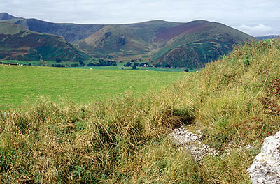 ENG: The Northwest Region, Cumbria, The Eden Valley, Penrith, Whitbarrow Village, View towards Blencathra, a peak within the Lakes District National Park, over an abandoned limestone quarry on the Naddles Crags outside the village [Ask for #262.454.]