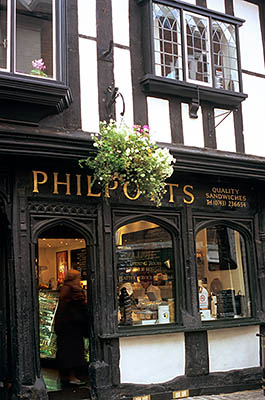 ENG: West Midlands Region, Shropshire, Shrewsbury and Atcham District, Shrewsbury, Phillpotts, a sandwich maker, occupies a historic half-timbered buildingon Butchers Row, a pedestrianized downtown street [Ask for #262.535.]