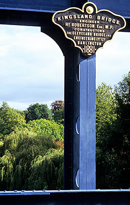 ENG: West Midlands Region, Shropshire, Shrewsbury and Atcham District, Shrewsbury, A bronze plaque identifies the builder of the 1882 Kingsland Bridge, a small private bridge over the River Severn in The Quarry (park) [Ask for #262.560.]