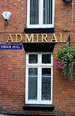 ENG: West Midlands Region, Shropshire, Shrewsbury and Atcham District, Shrewsbury, The Admiral Benbow, a small neighborhood pub in the residential area south of the city center within the river bend; street sign [Ask for #262.561.]