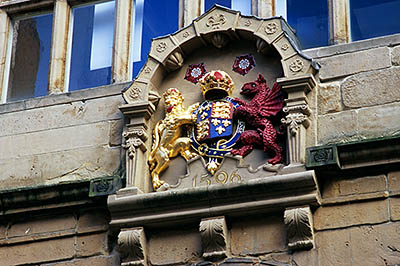 ENG: West Midlands Region, Shropshire, Shrewsbury and Atcham District, Shrewsbury, The seal of the County of Shropshire graces the stone Market Hall (1550), in The Square [Ask for #262.562.]