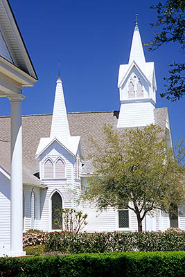 NC: Brunswick County, Cape Fear River Area, Southport, The twin steeples of Trinity Methodist Church, by Franklin Square Park, viewed from the Masonic Lodge [Ask for #263.022.]