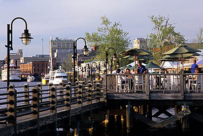 NC: New Hanover County, Cape Fear River Area, Wilmington, Riverfront, River Walk; people enjoy an evening stroll along the walk, at Chandlers Wharf [Ask for #263.070.]