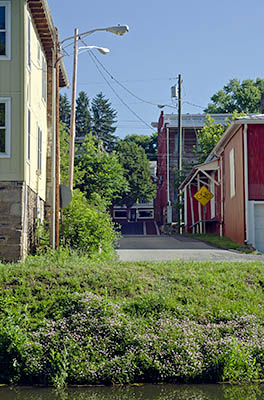 MD: Washington County, Potomac River Gorge, Hancock, Chesapeake and Ohio Canal National Historic Park, View towards town center from canal [Ask for #269.047.]