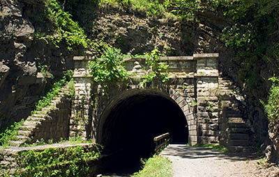 MD: Allegany County, Potomac River, The Chesapeake and Ohio Canal Nat Hist Park, Paw Paw Tunnel, The towpath emerges from the western mouth of the tunnel [Ask for #269.077.]