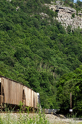 MD: Allegany County, Potomac River, Cumberland, Freight train enters the gorge [Ask for #269.101.]