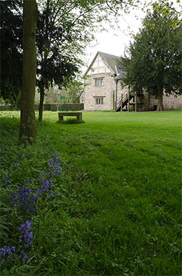 ENG: East Midlands Region, Leicestershire, Northwest Leicestershire, Coalville, Donnington le Heath Manor House, Side view of 13th c. manor house; bluebells [Ask for #270.061.]