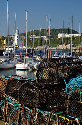 ENG: Yorkshire & Humberside Region, North Yorkshire, North Yorkshire Coast, Scarborough City, Old Harbour, View across harbor, with traps and lighthouse [Ask for #270.088.]