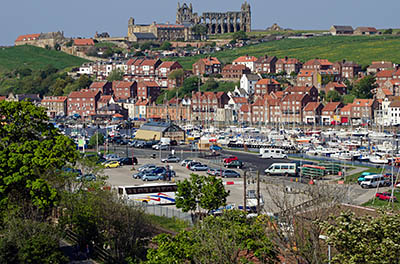 ENG: Yorkshire & Humberside Region, North Yorkshire, North Yorkshire Coast, Whitby, Town Center, View from the bluffs of the River Esk over the town center and harbor, with the abbey visible on the hill above [Ask for #270.153.]