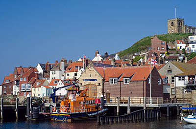 ENG: Yorkshire & Humberside Region, North Yorkshire, North Yorkshire Coast, Whitby, Town Center, View over harbor, showing modern RNLI lifeboat (rescue boat) [Ask for #270.158.]