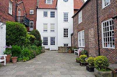 ENG: Yorkshire & Humberside Region, North Yorkshire, North Yorkshire Coast, Whitby, Town Center, Captain Cook Museum; courtyard and garden [Ask for #270.181.]