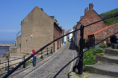 ENG: Yorkshire & Humberside Region, North Yorkshire, North Yorkshire Coast, Whitby, Abbey Steps, Steps leading to the abbey start at Church St., a historic, pedestrianized shopping lane; the Cleveland Way goes here. [Ask for #270.188.]