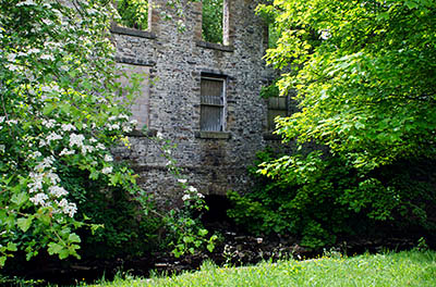 ENG: The Northwest Region, Lancashire, The Pennines, Rossendale, Stacksteads, Abandoned water-powered factory along the River Irwell, from the Irwell Sculpture Trail. [Ask for #270.366.]