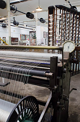 ENG: The Northwest Region, Lancashire, The Pennines, Burnley Borough, Briercliffe, Queen Street Mill, Spinning machine in the reception area and museum of this fully functioning Victorian textile plant [Ask for #270.383.]