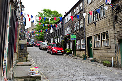 ENG: Yorkshire & Humberside Region, West Yorkshire, Bradford Borough, Haworth, View down Main Street [Ask for #270.418.]