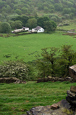 ENG: The Northwest Region, Lancashire, The Pennines, Pendle, Wycoller Moors, Isolated Pennine farmstead beneath open moors, in fog [Ask for #270.444.]