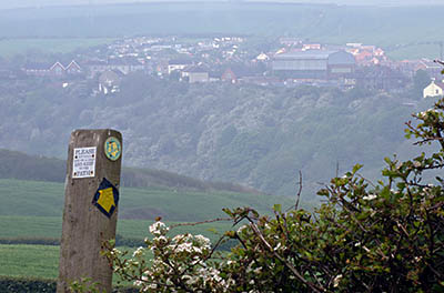 ENG: Yorkshire & Humberside Region, North Yorkshire, North Yorkshire Coast, Skinningrove, Stile and footpath gives view towards the village [Ask for #270.449.]