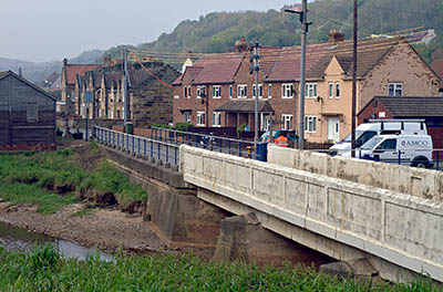 ENG: Yorkshire & Humberside Region, North Yorkshire, North Yorkshire Coast, Skinningrove, Main street of iron mining town located in a deep gorge cutting through the sea cliffs [Ask for #270.452.]