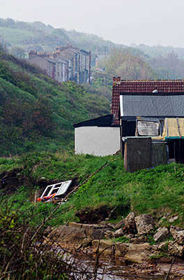 ENG: Yorkshire & Humberside Region, North Yorkshire, North Yorkshire Coast, Skinningrove, Main street of iron mining town located in a deep gorge cutting through the sea cliffs [Ask for #270.453.]