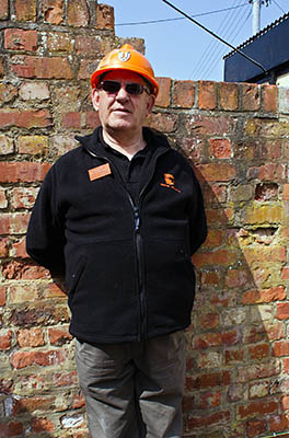 ENG: Yorkshire & Humberside Region, North Yorkshire, North Yorkshire Coast, Skinningrove, Cleveland Ironstone Mining Museum. Former miner Alan Richardson acts as a volunteer guide. [Ask for #270.460.]