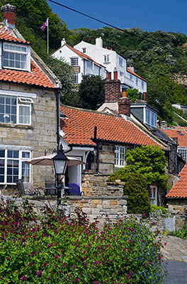 ENG: Yorkshire & Humberside Region, North Yorkshire, North Yorkshire Coast, Sea Cliffs, Runswick Bay, Old fishing village terraces up from the cliff foot; paths, not roads, serve these cottages [Ask for #270.468.]