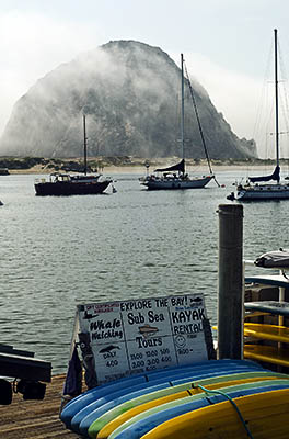 CA: South Coast Region, San Luis Obispo County, Pacific Coast Area, City of Morro Bay, Embarcadero, View from a kayak rental across Morro Bay towards Morro Rock [Ask for #271.016.]