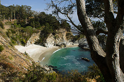 CA: South Coast Region, Monterey County, Los Padres National Forest, Big Sur, McWay Cove, Julia Pfeiffer Burns State Park, Waterfall flows over cliffs onto beach [Ask for #271.066.]