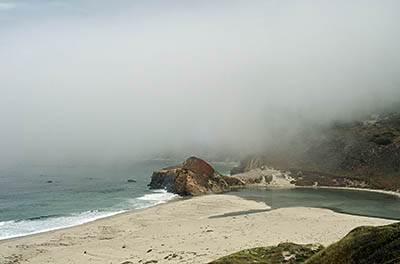 CA: South Coast Region, Monterey County, Los Padres National Forest, Big Sur, Little Sur River, View over the beach that has formed at the river's mouth, as the morning fog lifts [Ask for #271.078.]