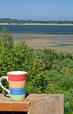 OR: South Coast Region, Coos County, Coos Bay Area, City of Coos Bay, Empire District, View west over Coos Bay towards Oregon Dunes National Recreation Area, from the deck of a vacation rental [Ask for #271.108.]