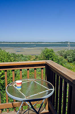 OR: South Coast Region, Coos County, Coos Bay Area, City of Coos Bay, Empire District, View west over Coos Bay towards Oregon Dunes National Recreation Area, from the deck of a vacation rental [Ask for #271.109.]