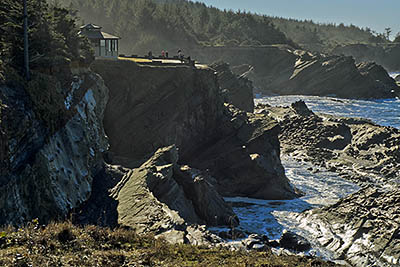 OR: Coos County, Coos Bay Area, Cape Arago Parks, Shore Acres Cliffs, View over sea cliffs towards the Shore Acres overlook pavillon [Ask for #276.361.]